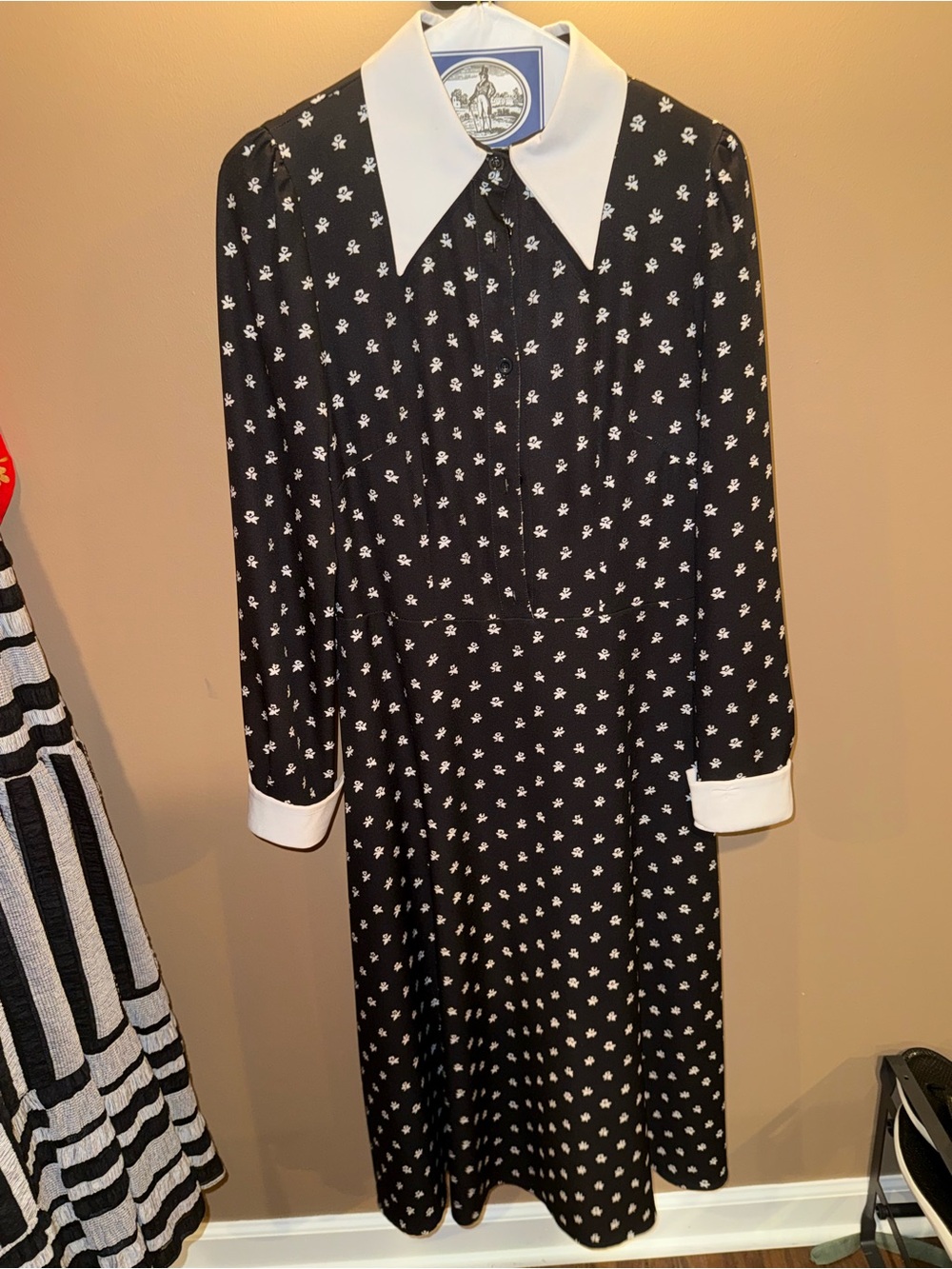 Black Long-Sleeve A-Line Dress with White Collar/Cuffs and White Floral Details